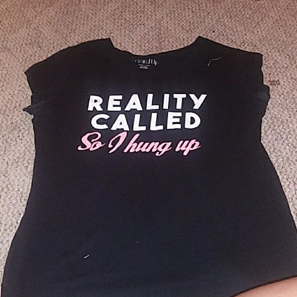 Black pink and white worded shirt